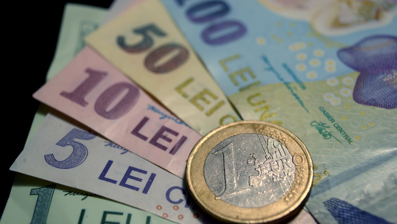 Euro a cedat 0,01% în lupta cu leul - leueuro-1604496138.jpg