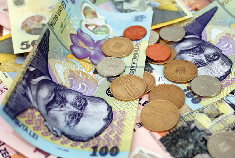 Leul s-a apreciat față de francul elvețian, euro și dolar - leul-1423761221.jpg