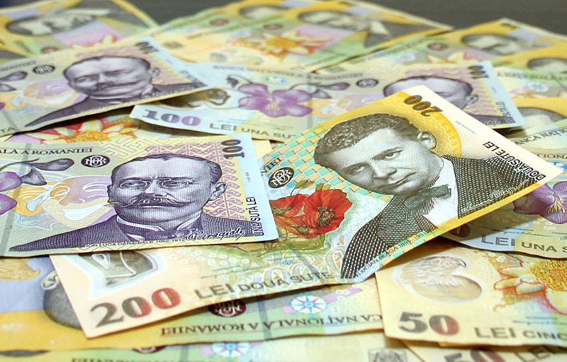 Leul jupoaie dolarul și francul elvețian, dar cedează la euro - leul-1500653638.jpg