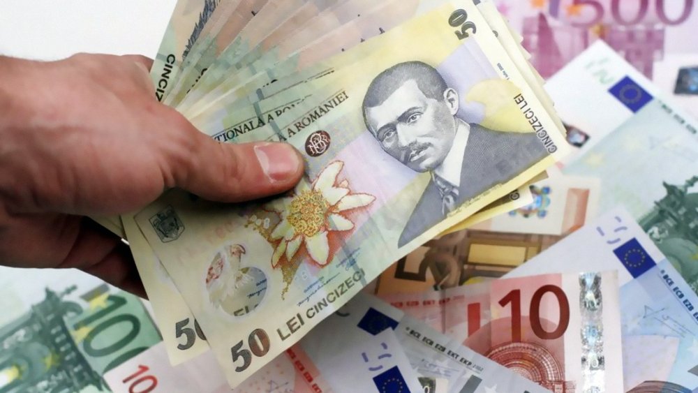 Leul pierde la euro, dar mușcă din dolar și francul elvețian - leul-1594654340.jpg