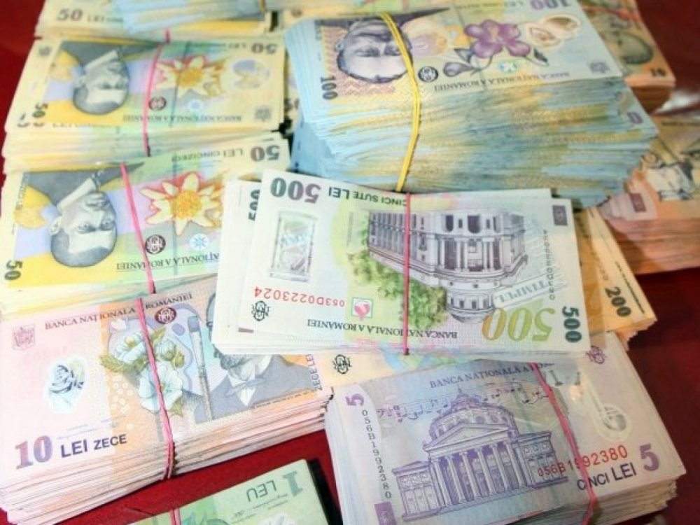 Leul câștigă la euro și dolar, dar pierde la francul elvețian - leul-1606500993.jpg