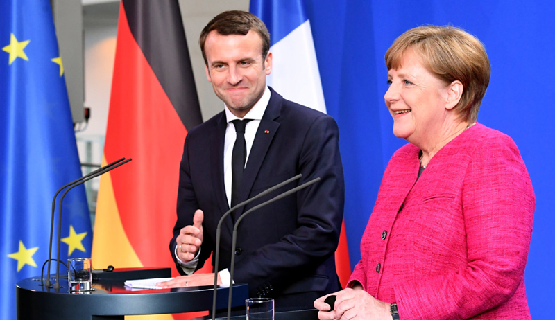 Macron îi cere lui Merkel să se angajeze în reforma UE și a zonei euro - macronsimerkel-1507722586.jpg