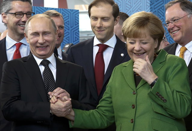 Vladimir Putin se întâlnește cu Angela Merkel pe 6 iunie - merkel-1401801409.jpg
