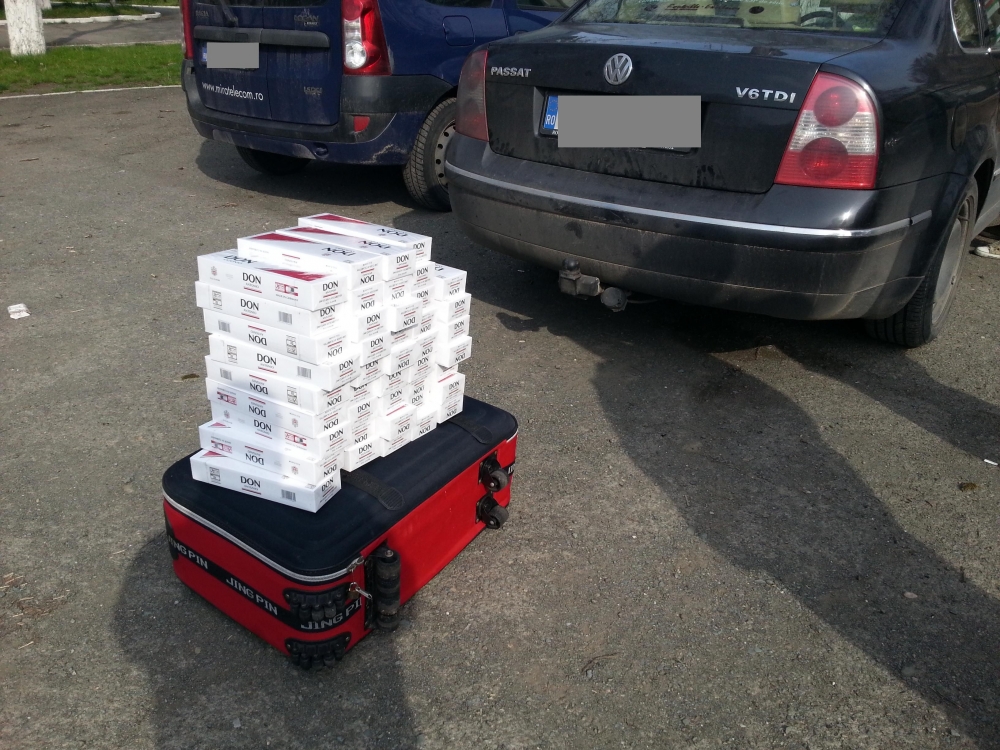 Peste 1.000 de pachete cu țigări de contrabandă, confiscate în Constanța - pesteomie-1398677747.jpg