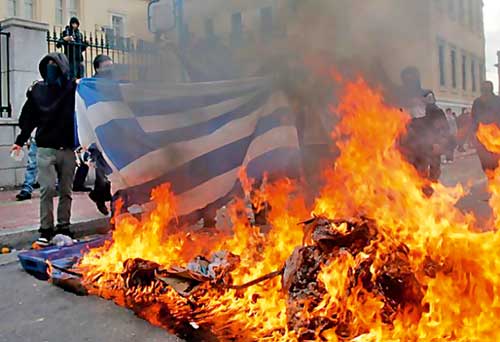 Protestatarii greci au cerut taxe de protecție proprietarilor de magazine, pentru a nu le devasta - protestegrecia-1329252929.jpg