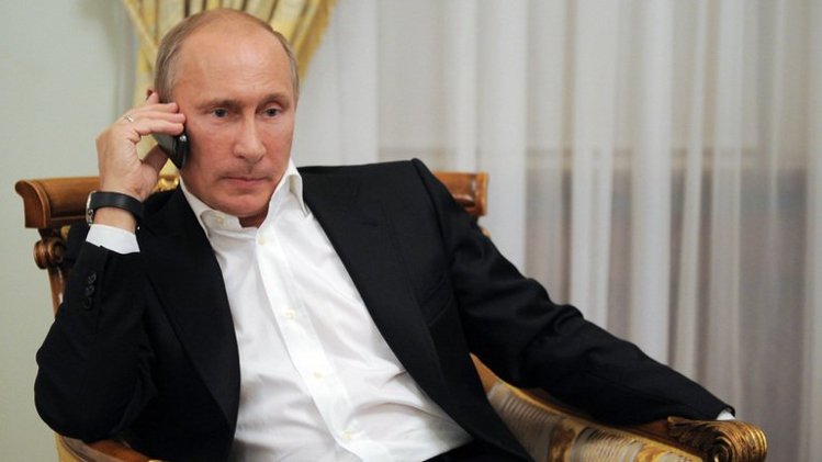 Putin a vorbit cu președintele Iranului  despre situația din Siria - putin-1377838491.jpg