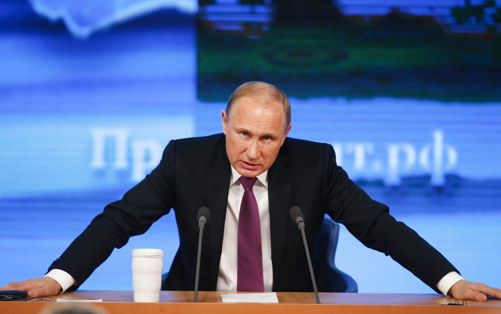 Putin a promulgat două legi privind știrile false și ofensele la adresa statului - putin-1553039219.jpg
