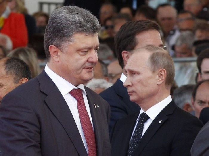 Război în Ucraina. Putin și Poroșenko au ajuns la un acord de pace - putinporoshenko800w700h800q90-1409734152.jpg