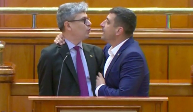 Virgil Popescu, luat de gât de George Simion la tribuna Parlamentului: 