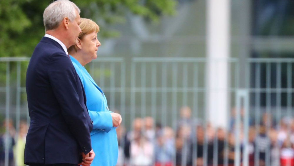 Angela Merkel, surprinsă tremurând puternic pentru a treia oară în mai puțin de o lună - skynewsangelamerkelgermany471443-1562761753.jpg