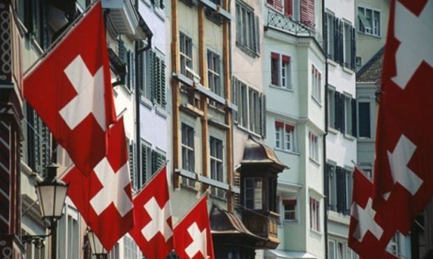 Elvețienii au votat în proporție de 50,4% în favoarea referendumului privind imigrația - steag-1391959898.jpg