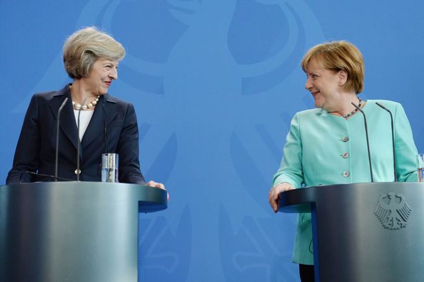 Angela Merkel respinge cererea premierului britanic de negocieri paralele - theresa-1490803583.jpg
