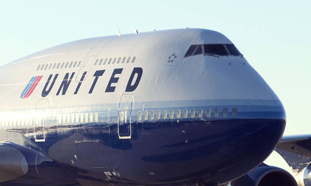 Doi piloți ai United Airlines, reținuți în stare de ebrietate înainte de decolare - unitedairlines-1472386526.jpg
