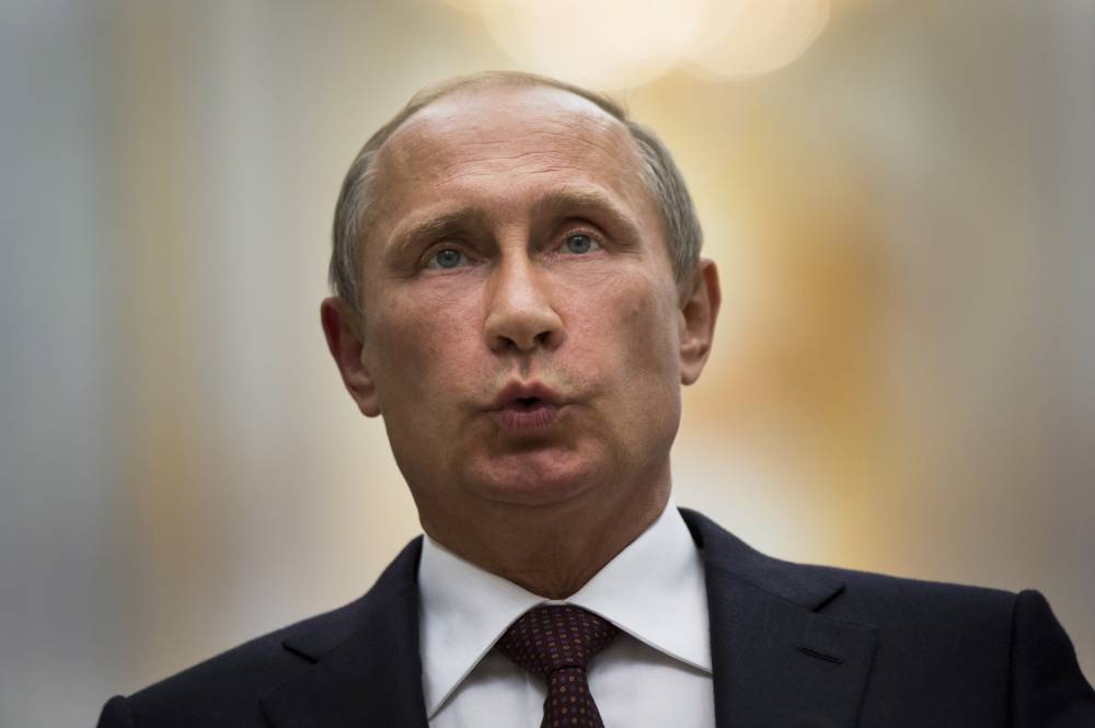 Vladimir Putin semnează legea ce permite Rusiei să nu aplice deciziile CEDO - vladimirputin-1450193223.jpg