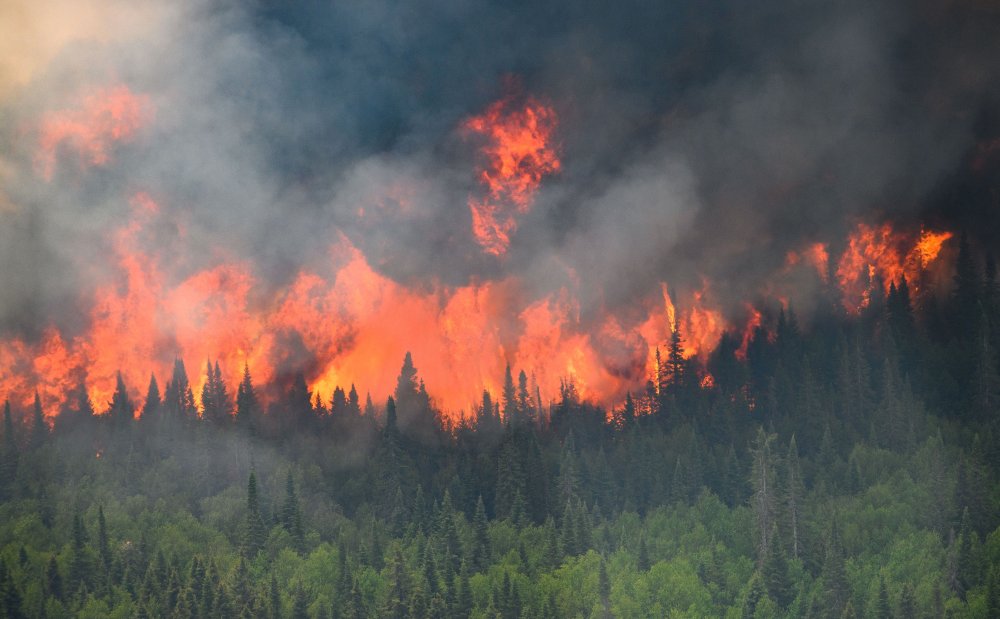 Emisiile de carbon provocate de incendiile din Canada au atins o cantitate record în 2023 - yghej5idjzjg3ffclwpkk62dfa-1687874593.jpg